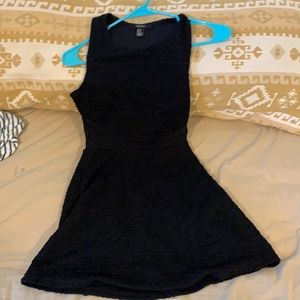Mini black dress with cutout mesh on the side